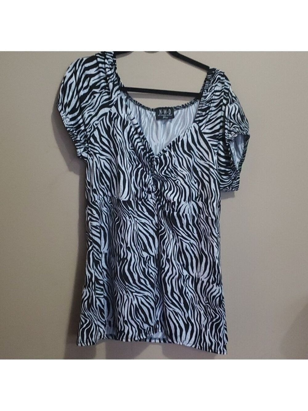 N.W.D top size 1x